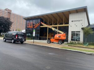 Sunray Window Films installation of 3M Prestige 20 and 70 Exterior Window Films at Resource Cleveland using a boom lift for high window access.