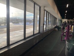 Planet Fitness interior showing storefront windows with 3M Night Vision 25 window film