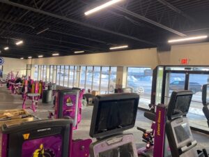 Interior workout area at Planet Fitness Mayfield Heights with 3M Night Vision 25 window film on storefront windows